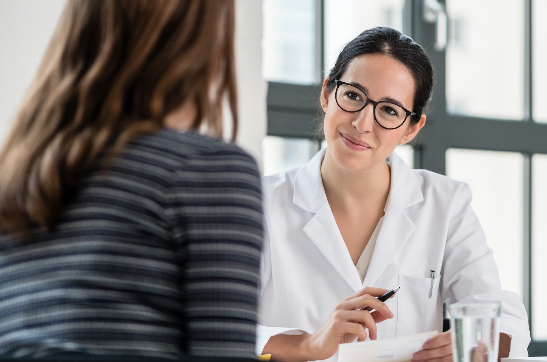 Doctor talking to patient