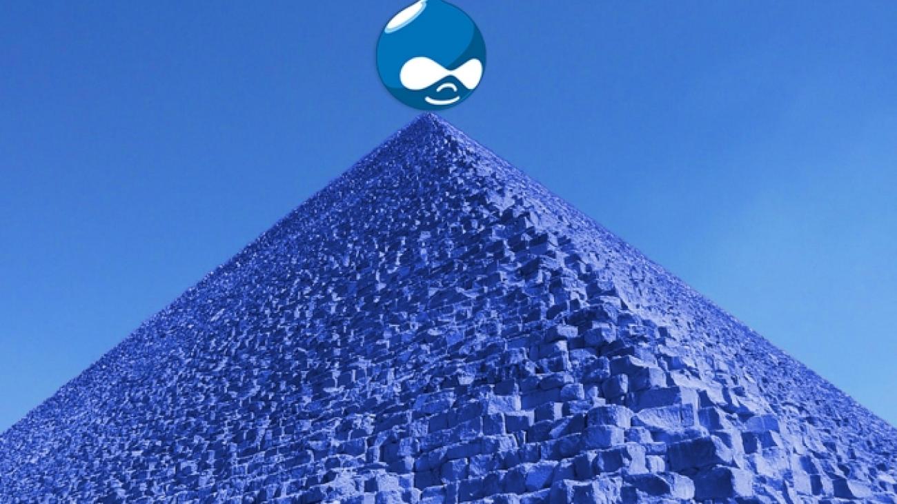 Blue photo of pyramid with Drupal logo sitting on top