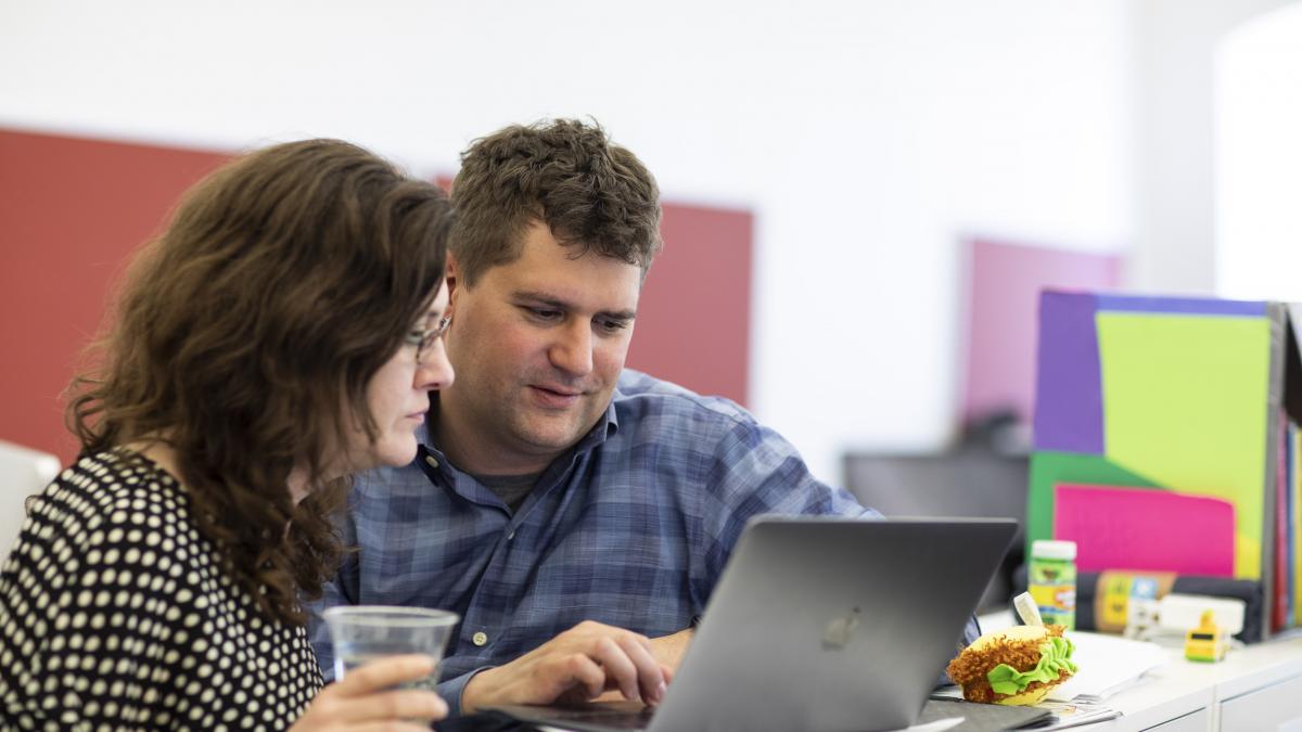 Couple looking at a computer together