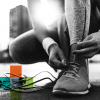 Runner stopping to tie shoe