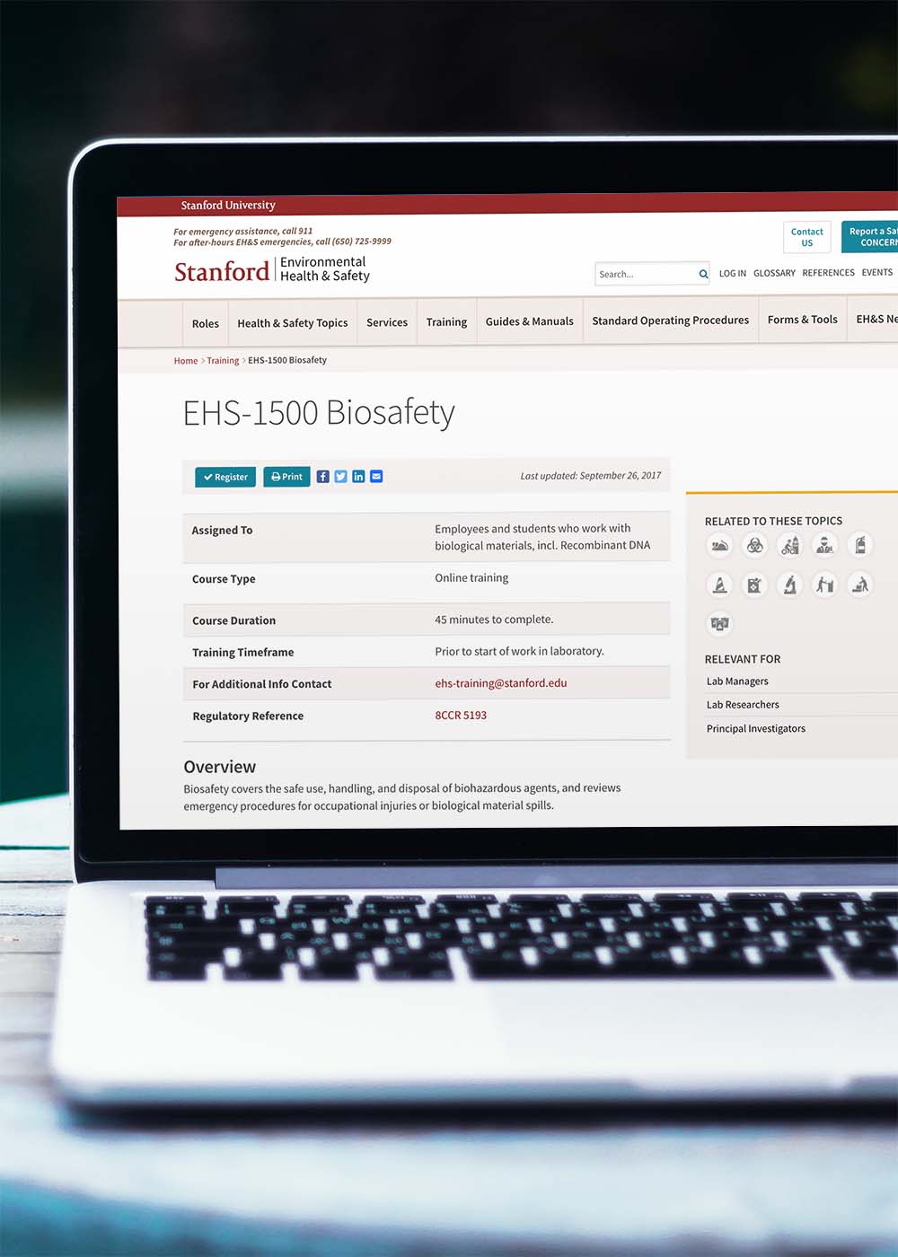 Stanford EHS biosafety page on a Macbook laptop